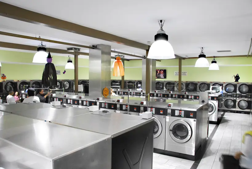 Wide view of the folding tables and washers