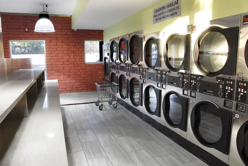 Brick wall and a long row of stacked dryers
